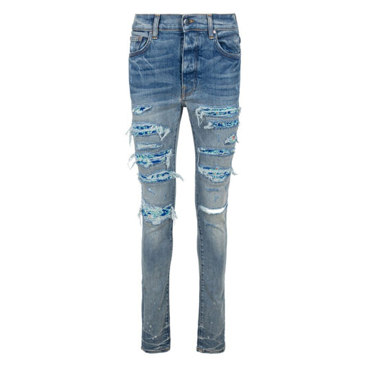 Amiri  Brand Embossed Ripped Blue Jeans