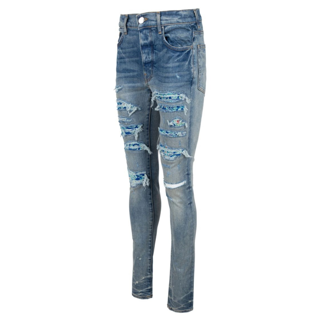 Amiri  Brand Embossed Ripped Blue Jeans