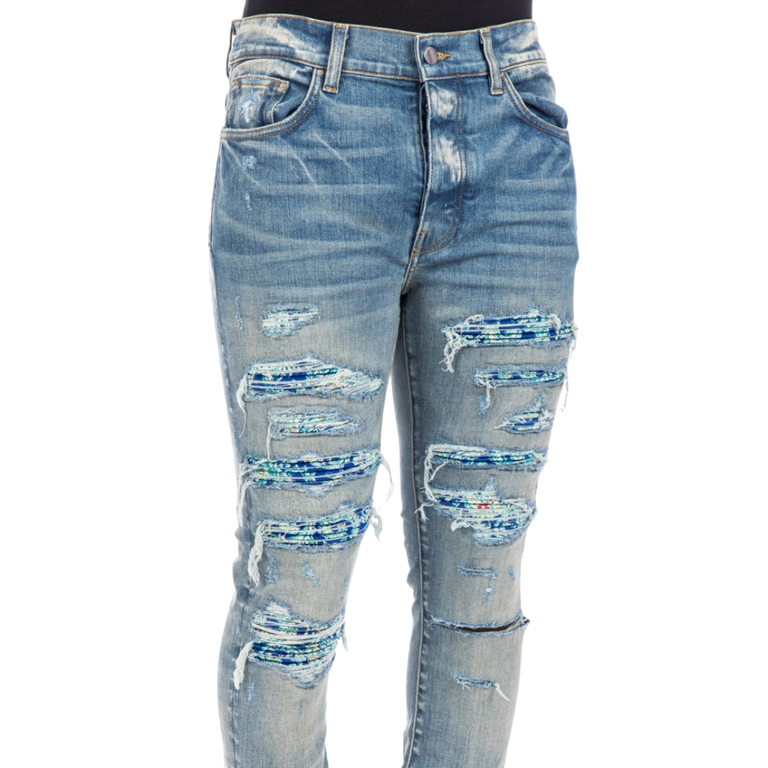 Amiri  Brand Embossed Ripped Blue Jeans